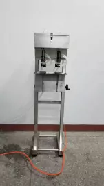 Машина для розлива спиртовой продукции на 2 сопла