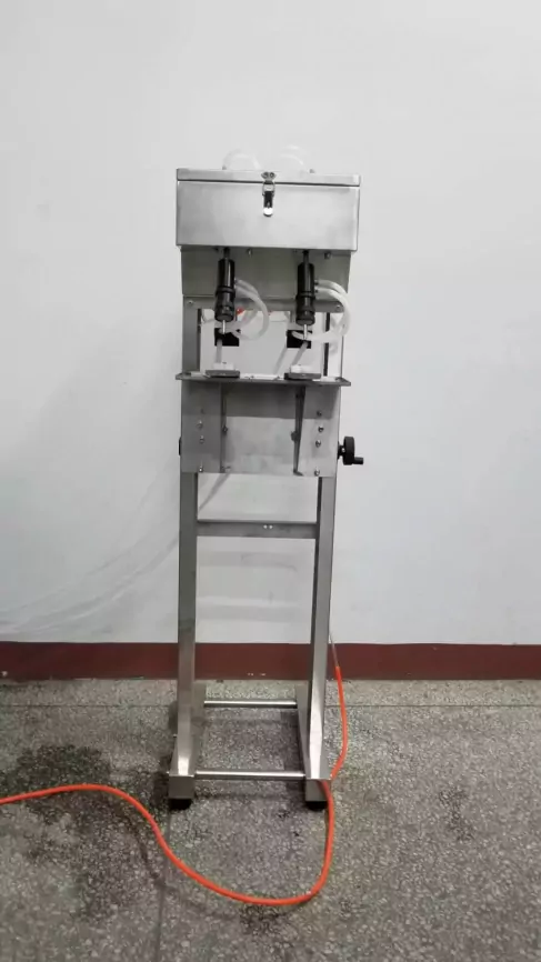 Машина для розлива спиртовой продукции на 2 сопла фото 1